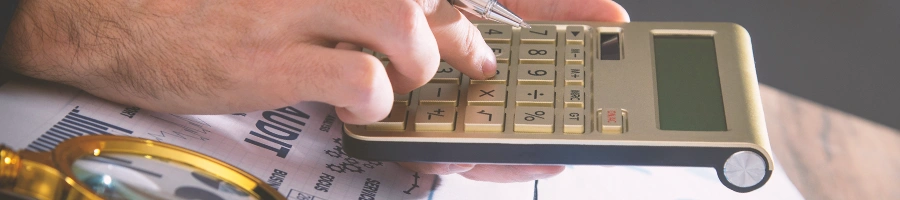 A person using a calculator