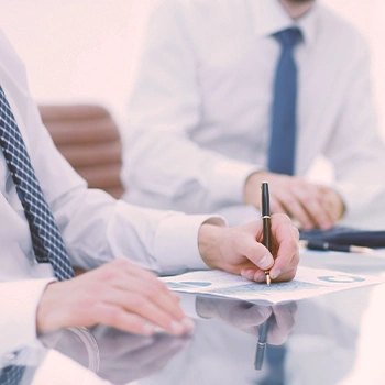 Two businessmen discussing at a table