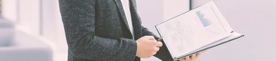 A man holding a clipboard