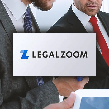 Legal zoom logo in front of businessmen talking to each other