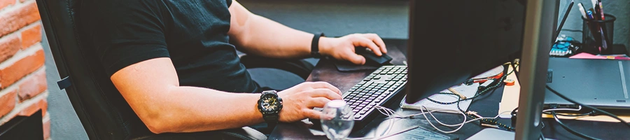 A person using his computer at home