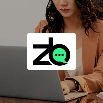 Logo of ZenBusiness with a hardworking business woman in the background