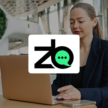 A working young entrepreneur and a ZenBusiness logo