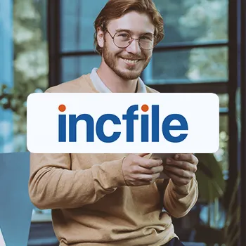 incfile logo in front of an office worker