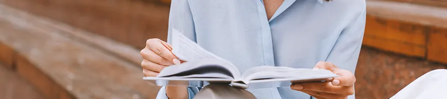 A businesswoman looking at a notebook