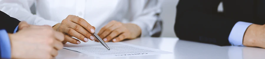 Close up shot of an office worker explaining paperwork