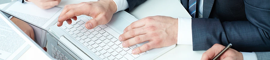 A business man reading the selection process of Georgia's LLC service