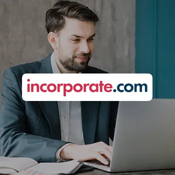 A handsome business man using a laptop and Incorporate.com logo