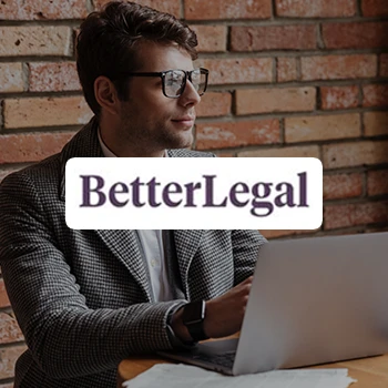 BetterLegal logo with a handsome business man using a laptop in the background