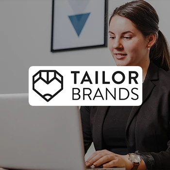 A business woman working in her laptop and a logo of Tailor Brands