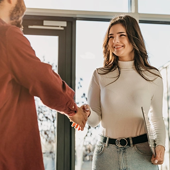 Shaking hands with a professional business person