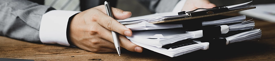 Man organizing paper works