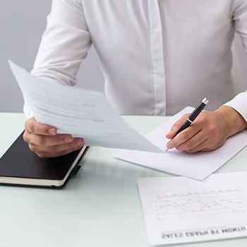 A business man working on local business licenses