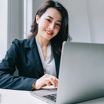 A business woman working on her business name reservation