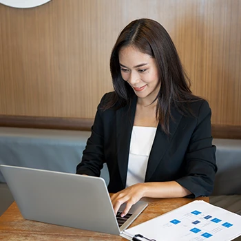 A business woman working on her business name reservation