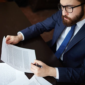 A business man reading some important document