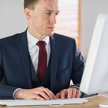 A business man working on his computer