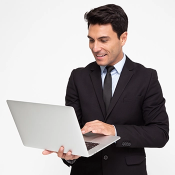 Man using laptop for online filings