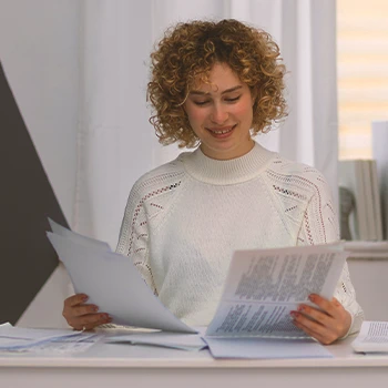 An LLC owner looking at paperwork