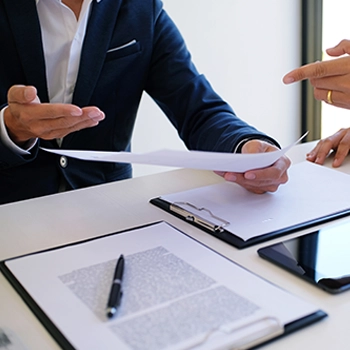 Businessman showing paperworks