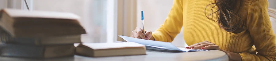 An office worker filing paperwork