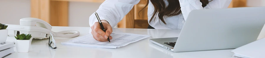 A person doing paperwork in the office