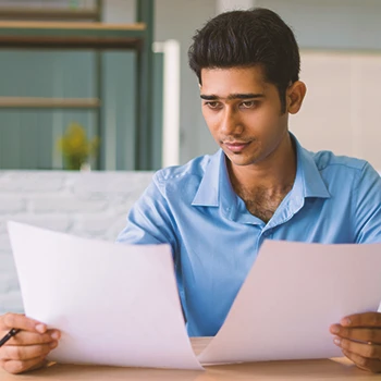 A person in an office doing paperwork