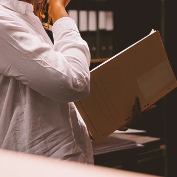 A person filing paper work