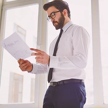 A person filing paperwork in person