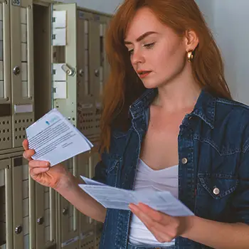 An LLC owner filing paperwork through mail