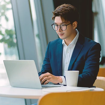 A person filing paperwork online