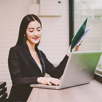 A person filing paperwork online