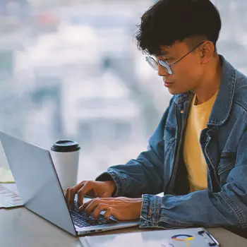 A person filing paperwork online