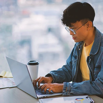 A person filing paperwork online