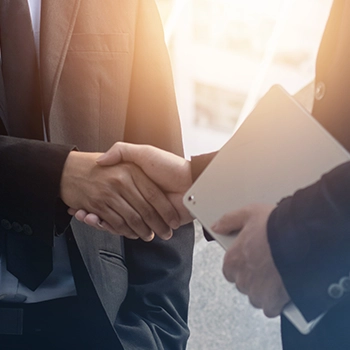 Shaking hands with a registered agent