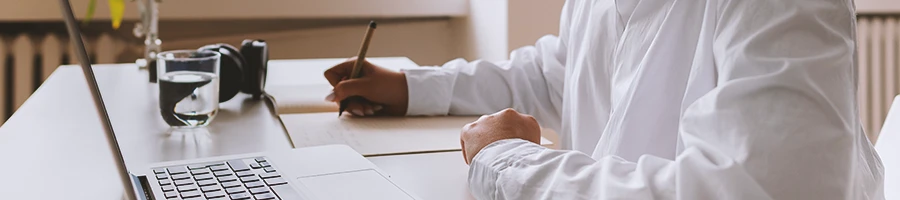 A person doing paperwork to become a registered agent