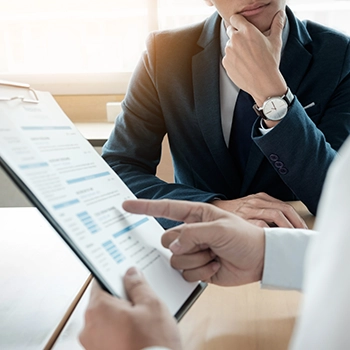 Checking and reading a document in front of someone