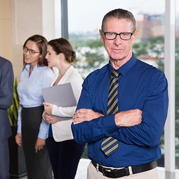 Registered agent posing in front of a team