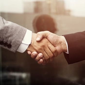 Shaking hands as a sign of agreement