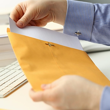 Opening an envelope to check the file