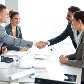 People shaking hands showing an agreement on the cost of an LLC cost in Washington D.C