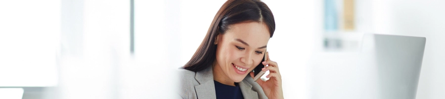 Woman talking on the phone as a registered agent for a corporation
