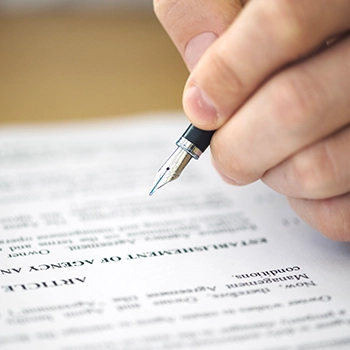 Signing a contract using a pen