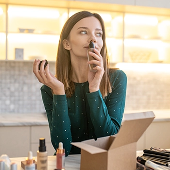 A woman testing a certain beauty product