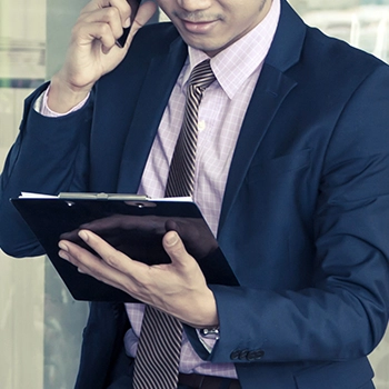 Businessman talking on the phone in Virginia office