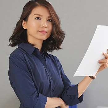 Holding a piece of annual report