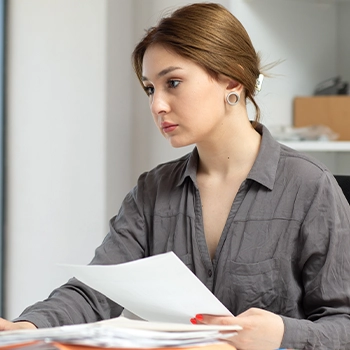 Woman busy working on documents in Idaho