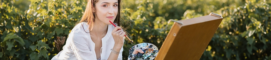 Woman thinking how to open a painting business