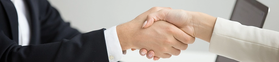 Shaking hands for a newly hired employee