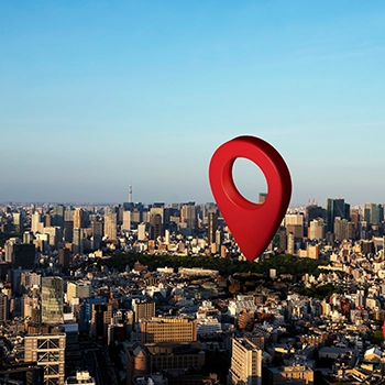 Red pin on top of buildings